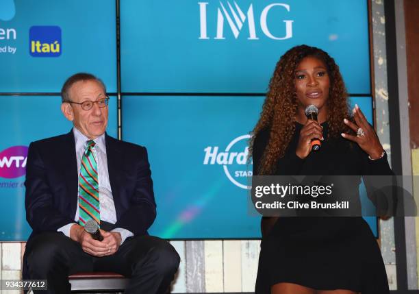 Serena Williams of the United States speaks at the press conference watched by Stephen Ross, Miami Dolphins owner prior to the ground breaking...