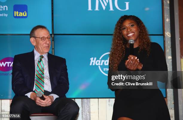 Serena Williams of the United States speaks at the press conference watched by Stephen Ross, Miami Dolphins owner prior to the ground breaking...