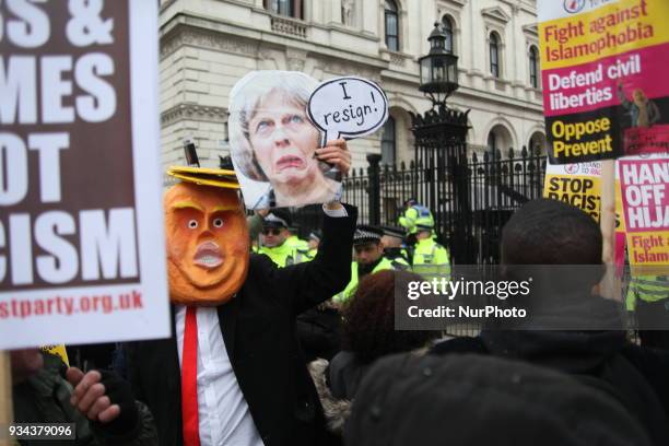 Protesters at UN Anti-Racism Day March outside Downing Street, London, on 17 March 2018. The annual Stand Up To Racism demonstration is held on...