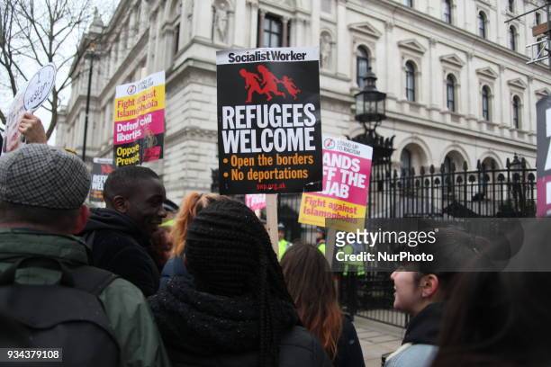 Protesters at UN Anti-Racism Day March outside Downing Street, London, on 17 March 2018. The annual Stand Up To Racism demonstration is held on...