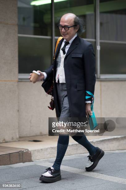 Guest is seen wearing a black blazer with grey shorts during the Amazon Fashion Week TOKYO 2018 A/W on March 19, 2018 in Tokyo, Japan.