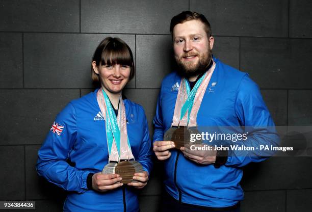 ParalympicsGB's Millie Knight and guide Brett Wild poses with their Bronze and 2 Silver medals as the team arrive at Heathrow Airport, London,...