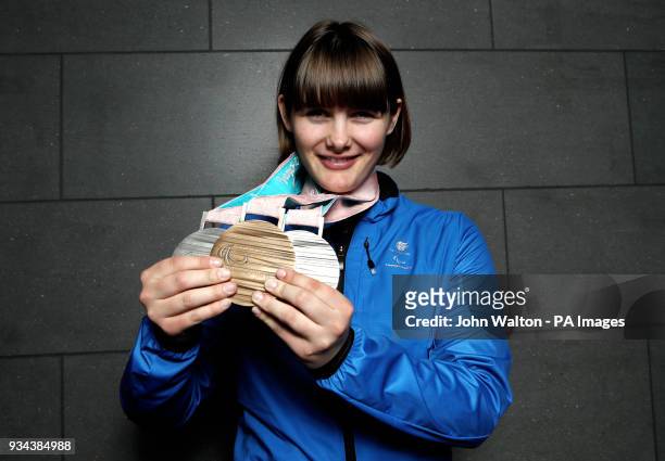 ParalympicsGB's Millie Knight poses with her Bronze and 2 Silver medals as the team arrive at Heathrow Airport, London, following the PyeongChang...