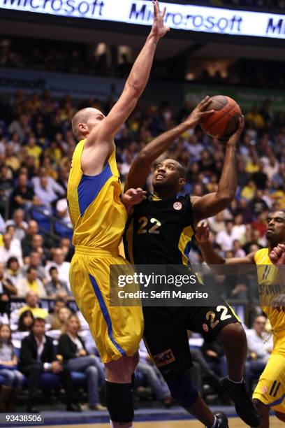 Jamon Lucas, #22 of Maroussi Costa Coffee competes with Maciej Lampe, #14 of Maccabi Electra in action during the Euroleague Basketball Regular...