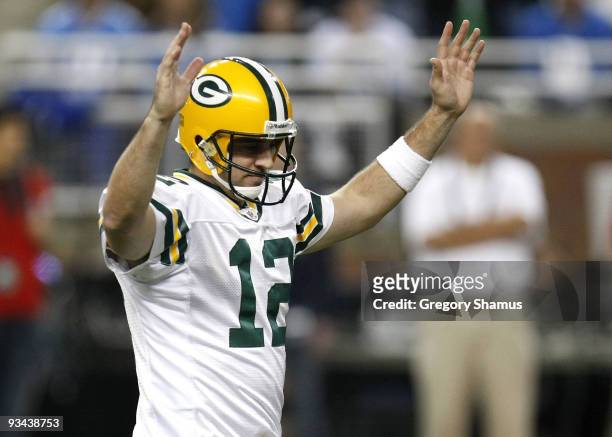 Aaron Rodgers of the Green Bay Packers reacts after throwing a second quarter touchdown against the Detroit Lions on November 26, 2009 at Ford Field...