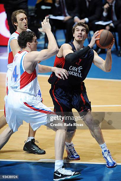 Sasha Kaun, #24 of CSKA Moscow and Zoran Planinic, #34 of CSKA Moscow compete with Tiago Splitter, #21 of Caja Laboral during the Euroleague...