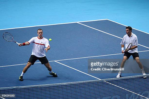 Frantisek Cermak of Czech Republic plays with Michal Mertinak of Slovakia during the men's doubles round robin match against Mariusz Fyrstenberg of...