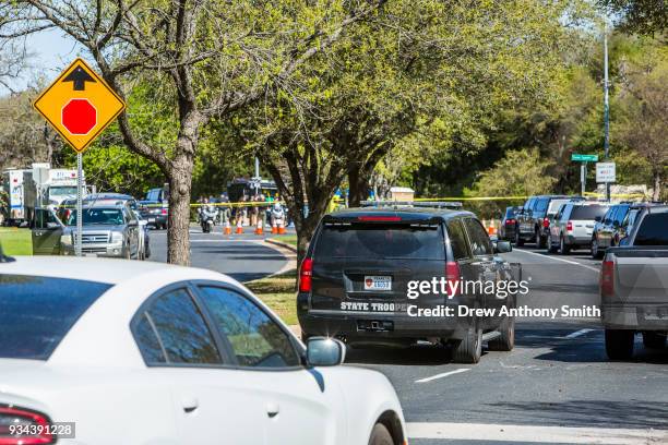 Police tape marks off the neighborhood where a package bomb went off on March 19, 2018 in Austin, Texas. Police are investigating the bombing which...
