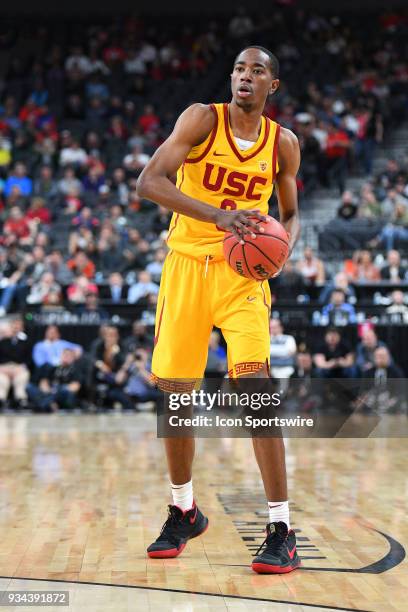 Guard Shaqquan Aaron looks to make a pass during the quarterfinal game of the mens Pac-12 Tournament between the Oregon State Beavers and the USC...