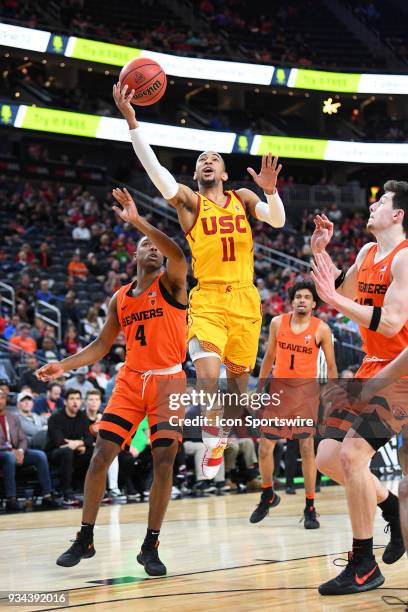 Guard Jordan McLaughlin drives to the basket during the quarterfinal game of the mens Pac-12 Tournament between the Oregon State Beavers and the USC...