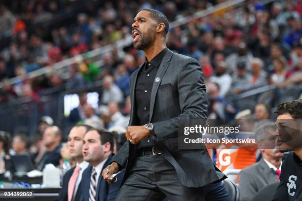 Assistant coach Jason Hart reacts to a play during the quarterfinal game of the mens Pac-12 Tournament between the Oregon State Beavers and the USC...