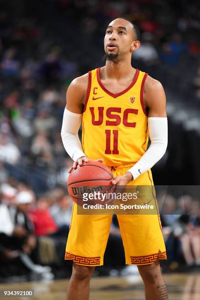 Guard Jordan McLaughlin shoots a free throw during the quarterfinal game of the mens Pac-12 Tournament between the Oregon State Beavers and the USC...
