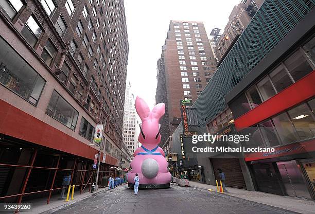 People prepare the Energizer Bunny balloon during the 83rd annual Macy's Thanksgiving Day parade on the Streets of Manhattan on November 26, 2009 in...