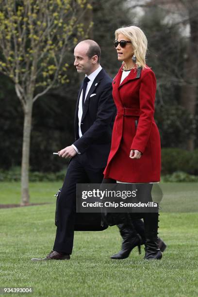 White House Senior Advisor to the President Stephen Miller and Counselor to the President Kellyanne Conway leave the White House March 19, 2018 in...