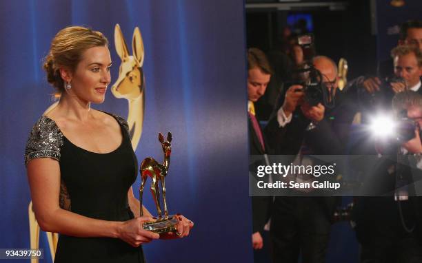 Actress Kate Winslet poses with the award 'Actress International' at the Bambi Awards 2009 show at the Metropolis Hall at the Filmpark Babelsberg on...