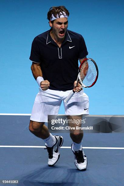 Roger Federer of Switzerland celebrates a point during the men's singles round robin match against Juan Martin Del Potro of Argentina during the...