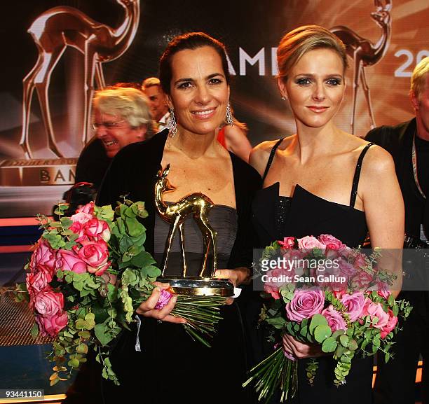 Roberta Armani poses with the award 'Creativity' and swimmer Charlene Wittstock during the Bambi Awards 2009 show at the Metropolis Hall at the...