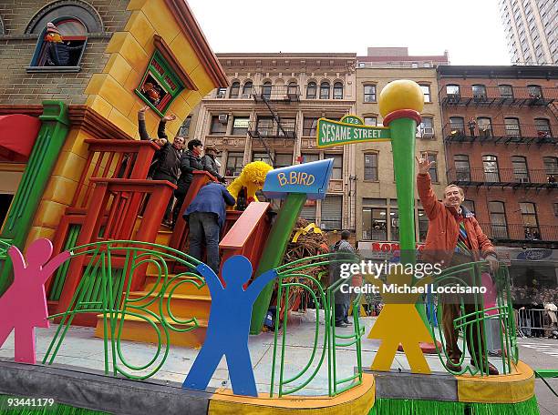 Sesame Street's Bob McGrath waves to the crowd while riding on a float during the 83rd annual Macy's Thanksgiving Day parade on the Streets of...