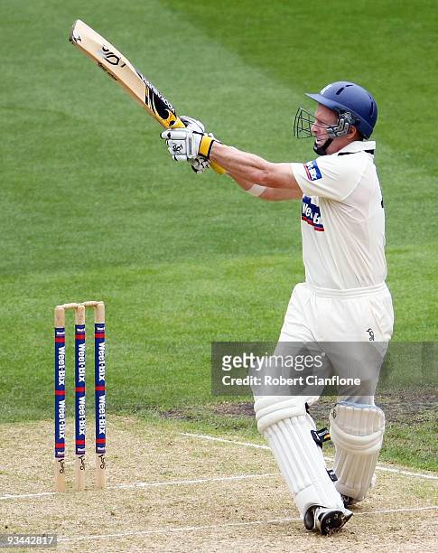 Chris Rogers of Victoria plays a pull shot during day one of the Sheffield Shield match between the Victorian Bushrangers and the Queensland Bulls at...