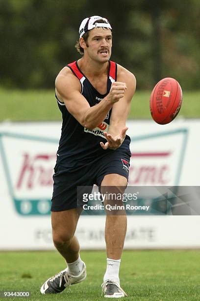 Jared Rivers of the Demons handballs during a Melbourne Demons AFL training session at Casey Fields on November 27, 2009 in Melbourne, Australia.