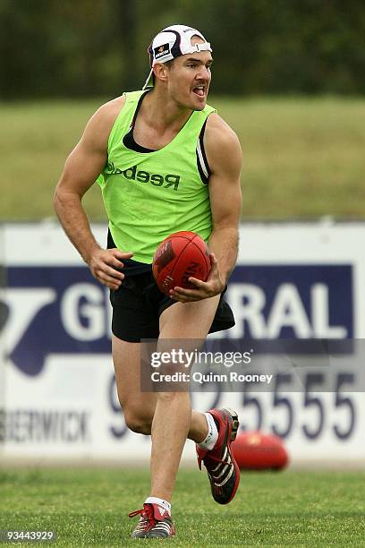 Brad Green of the Demons handballs during a Melbourne Demons AFL training session at Casey Fields on November 27, 2009 in Melbourne, Australia.