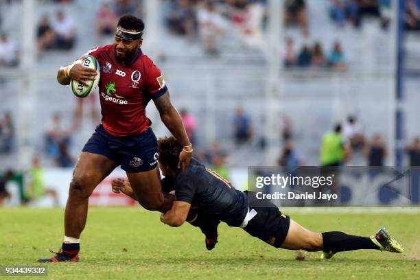 Samu Kerevi of Reds is tackled by Nicolás Sánchez during a match between Jaguares and Reds as part of the fifth round of Super Rugby at Jose...