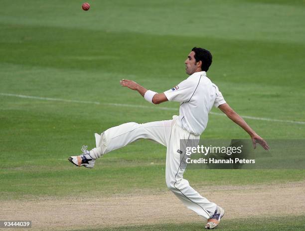 Umar Gul of Pakistan kicks the ball away during day four of the First Test match between New Zealand and Pakistan at University Oval on November 27,...