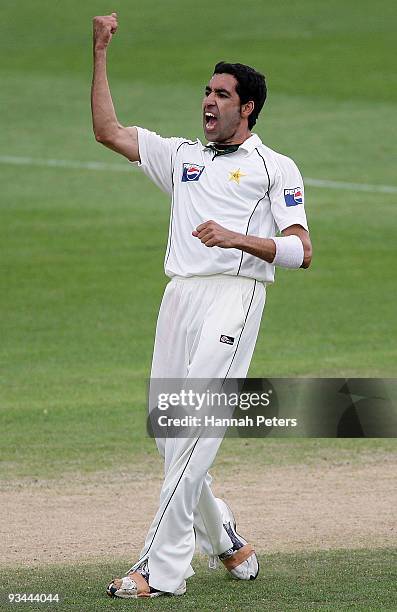 Umar Gul of Pakistan celebrates the wicket of Peter Fulton of New Zealand during day four of the First Test match between New Zealand and Pakistan at...