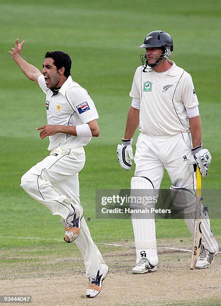 Umar Gul of Pakistan celebrates the wicket of Peter Fulton of New Zealand during day four of the First Test match between New Zealand and Pakistan at...