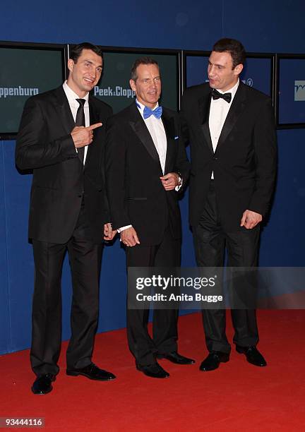 Vladimir Klitschko, Henry Maske and Vitali Klitschko arrive to the Bambi Awards 2009 at the Metropolis Hall at the Filmpark Babelsberg on November...