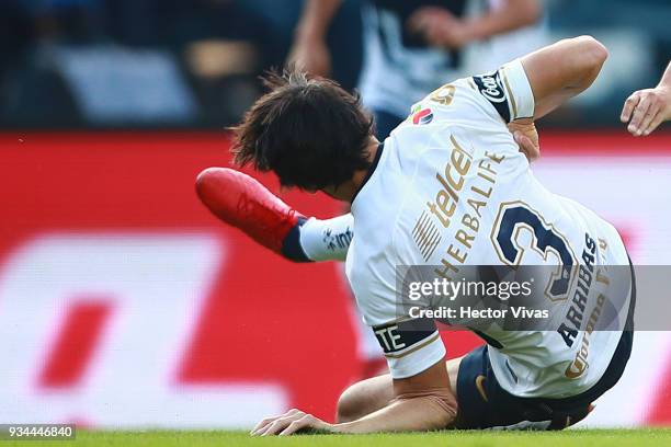 Alejandro Arribas of Pumas injures his left elbow when falling during the 12tth round match between Cruz Azul and Pumas UNAM as part of the Torneo...