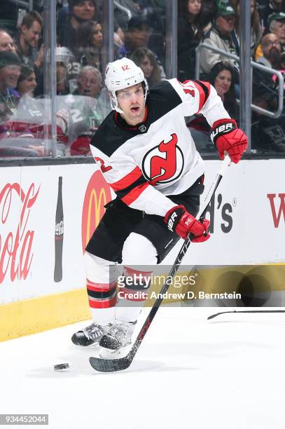 Ben Lovejoy of the New Jersey Devils handles the puck during a game against the Los Angeles Kings at STAPLES Center on March 17, 2018 in Los Angeles,...