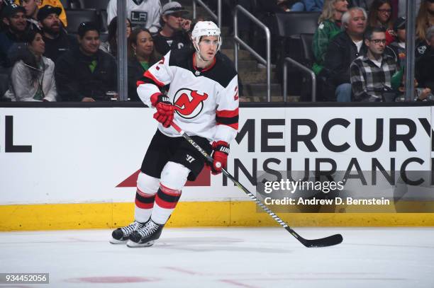 John Moore of the New Jersey Devils skates on ice during a game against the Los Angeles Kings at STAPLES Center on March 17, 2018 in Los Angeles,...