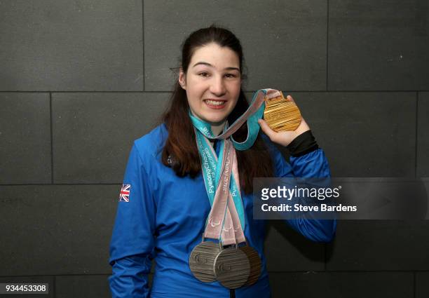 Medaliist Menna Fitzpatrick poses with her respective medals as Team ParalympicsGB arrive back from the PyeongChang 2018 Paralympic Winter Games at...