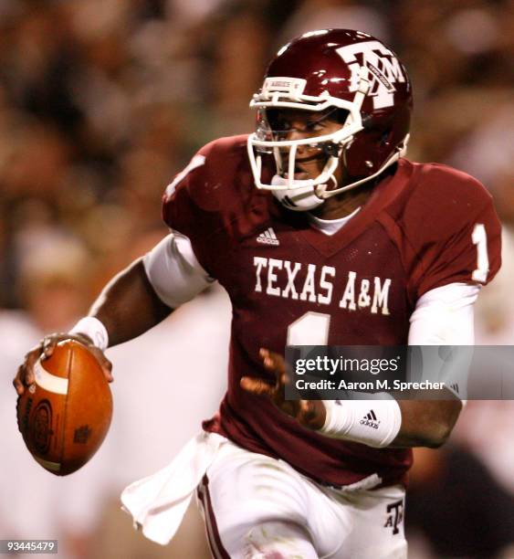 Quarterback Jerrod Johnson of the Texas A&M Aggies looks to throw the ball downfield to an open receiver against the Texas Longhorns in the second...