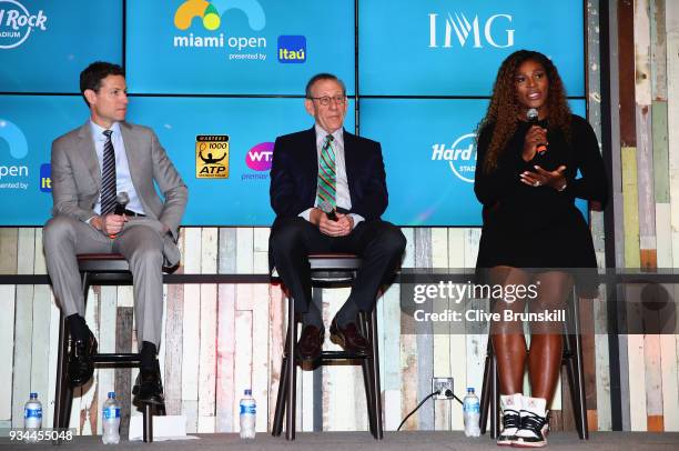 Serena Williams of the United States speaks at the press conference watched by Stephen Ross, Miami Dolphins owner and Mark Sharpiro WME/IMG...