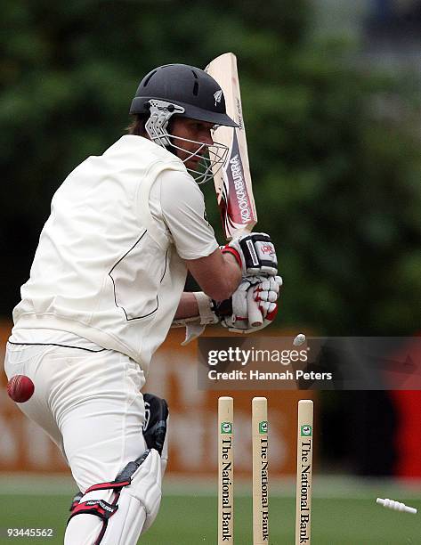 Shane Bond of New Zealand is bowled by Mohammad Asif of Pakistan during day four of the First Test match between New Zealand and Pakistan at...