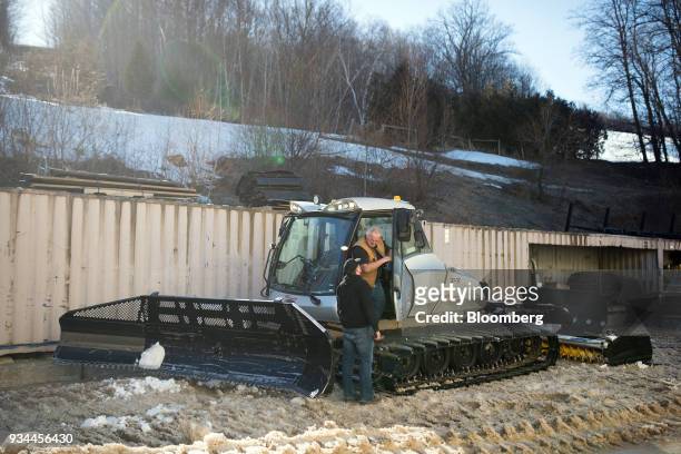 Grooming machine operator prepares to work on a ski run at the Blue Mountain Resorts Holding Inc. Ski Resort in Collingwood, Ontario, Canada, on...
