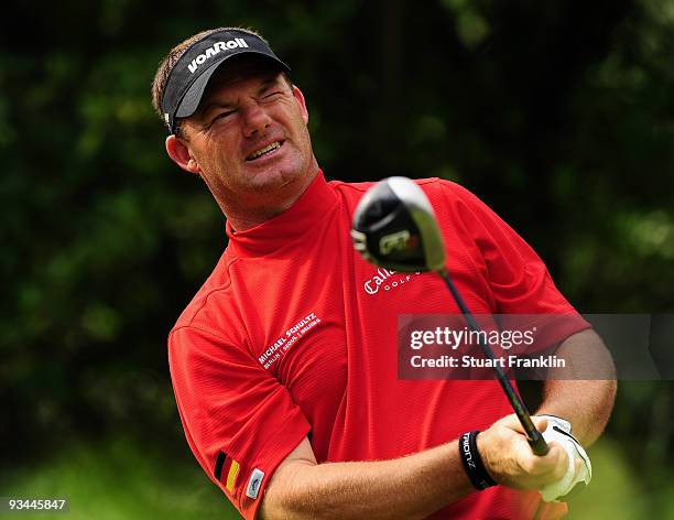 Alex Cejka of Germany plays his tee shot on the fourth hole during Foursomes on the second day of the Omega Mission Hills World Cup on the Olazabal...