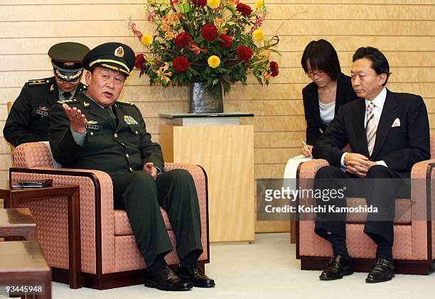 Chinese Defence Minister Liang Guanglie meets with Japanese Prime Minister Yukio Hatoyama prior to their meeting at Hatoyama's official residence on...