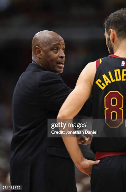 Associate head coach Larry Drew of the Cleveland Cavaliers gives instructions to Jose Calderon during the second half against the Chicago Bulls at...
