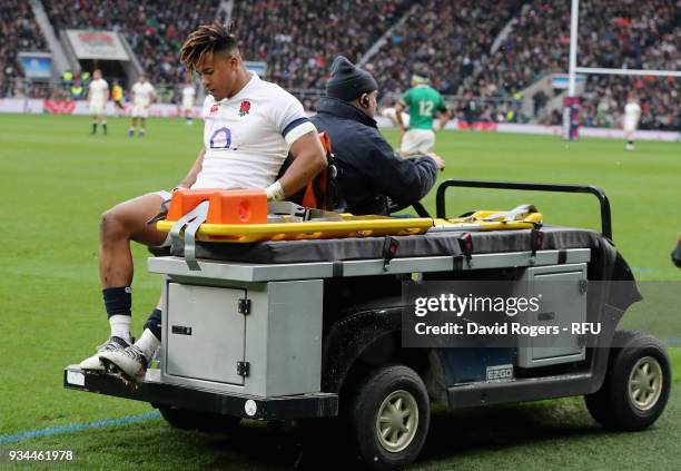 Anthony Watson, of England is carried off the pitch after snapping his achilles during the NatWest Six Nations match between England and Ireland at...