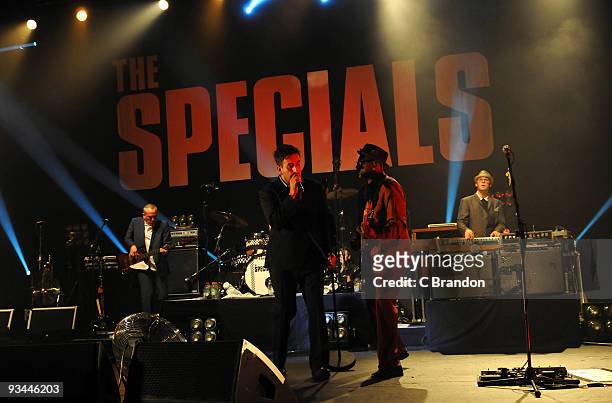 Horace Panter, Terry Hall, Lynval Golding and Nik Torp of The Specials perform on stage at Hammersmith Apollo on November 25, 2009 in London, England.