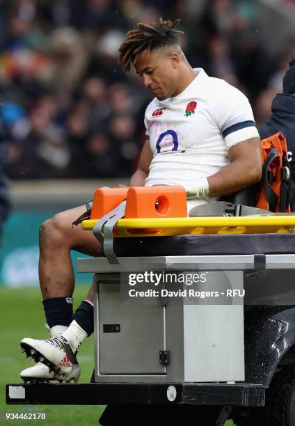 Anthony Watson, of England is carried off the pitch after snapping his achilles during the NatWest Six Nations match between England and Ireland at...