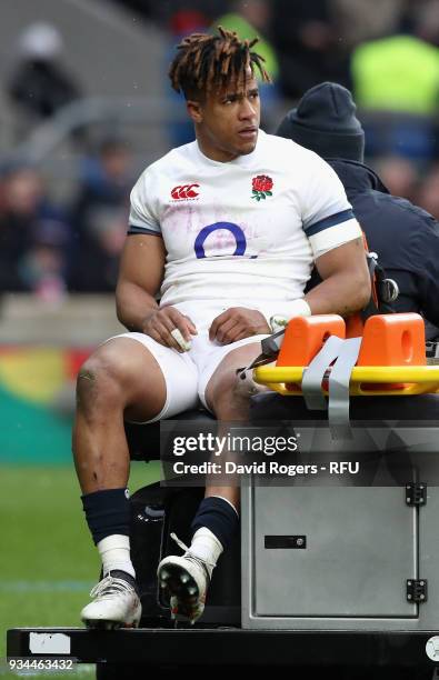 Anthony Watson, of England is carried off the pitch after snapping his achilles during the NatWest Six Nations match between England and Ireland at...