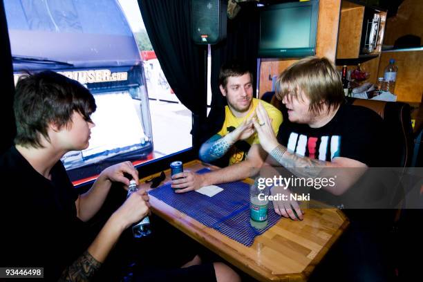 James Smith, Grant Brandell and Christopher Dudley of Underoath on the tour bus at Estragon on April 15th, 2009 in Bolgna, Italy. During the 'Give It...