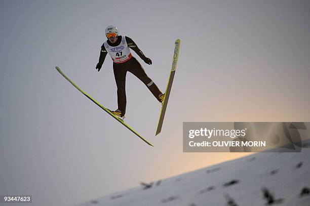 Finland's Janne Ryynaenen jumps during the Provisional Round of the Nordic Combined World Cup in Ruka-Kuusamo on November 27, 2009. Ryynaenen took...