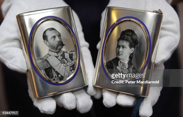 Pair of silver and enamel cigarette cases bearing images of Emperor Alexander II and Grand Duchess Maria Pavlovna is displayed at Sotheby's on...