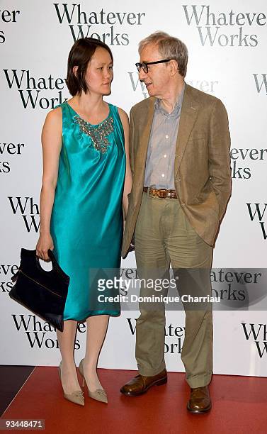 Director Woody Allen and wife Soon-Yi Previn attend the "Whatever Works" Paris premiere at Cinema Gaumont Opera on June 19, 2009 in Paris, France.