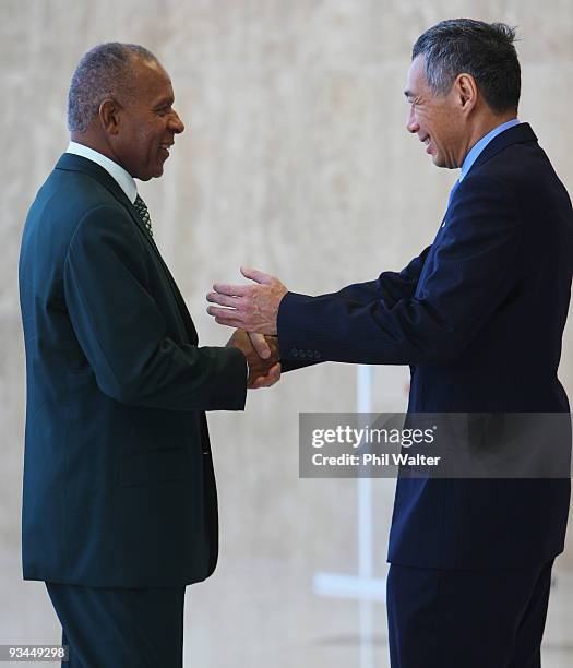 Singapore Prime Minister Lee Loong meets the Prime Minister of Trinidad and Tobago Patrick Mannning at the Opening Ceremony for the Commonwealth...